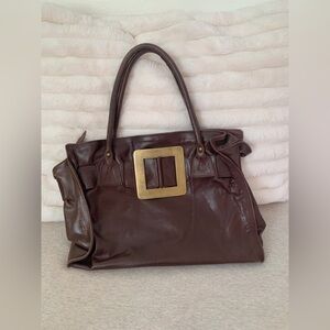 Brown leather vintage bag with gold buckle detail